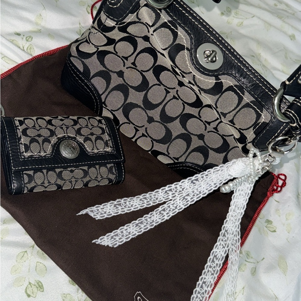 Coach Turnlock Signature Shoulder Purse
+ matching signature wallet
